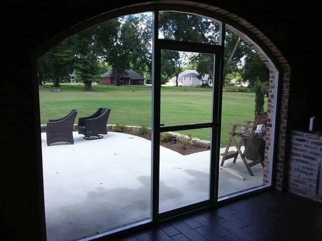 Sliding glass panels opening onto a patio